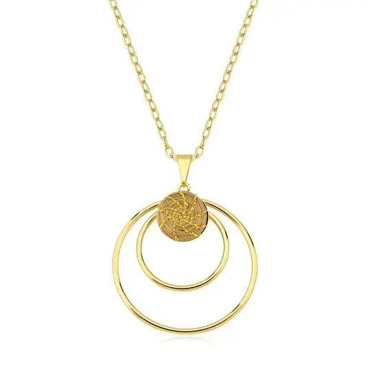 Gold double circle pendant necklace with intricate mandala pattern on white background