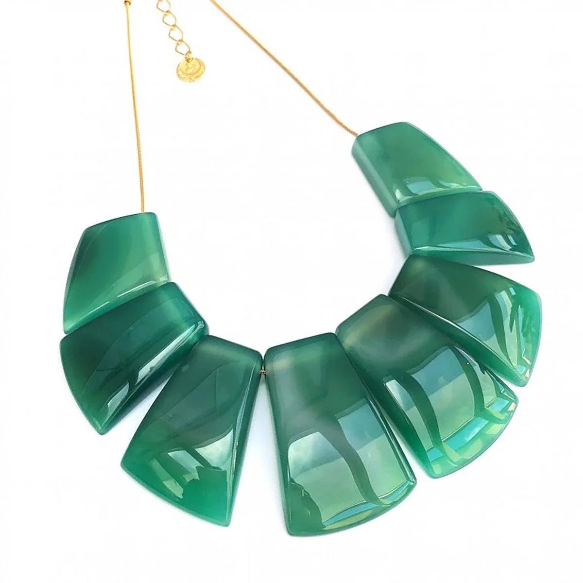 Green agate statement necklace with eight polished stones and a gold adjustable chain