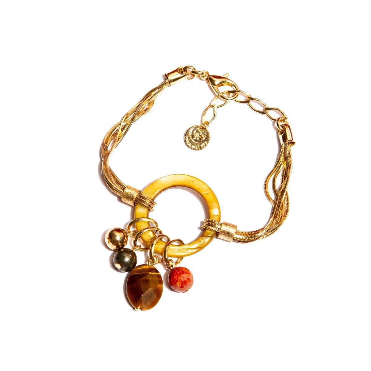 Gold hoop bracelet with multicolored stone charms on white background