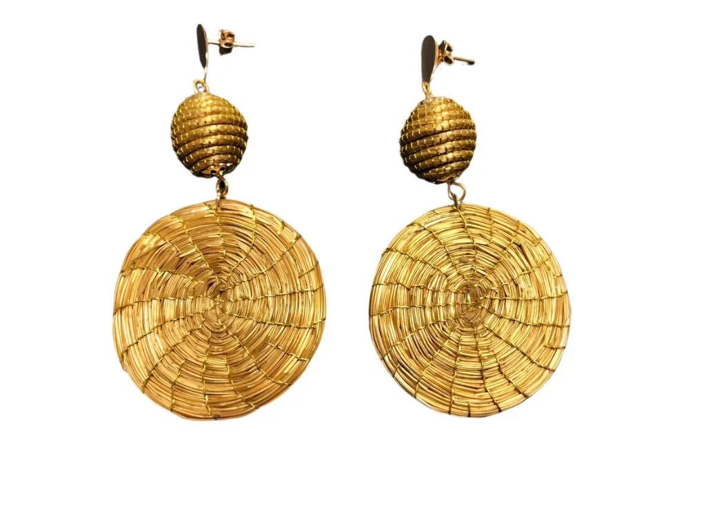 Gold-tone woven grass mandala drop earrings with textured globe accents on white background