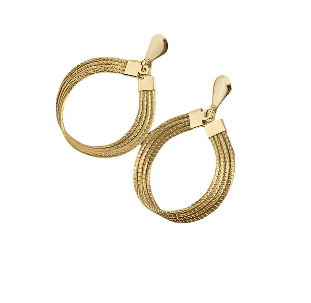 Textured golden oval dangle earrings with layered bands on white background
