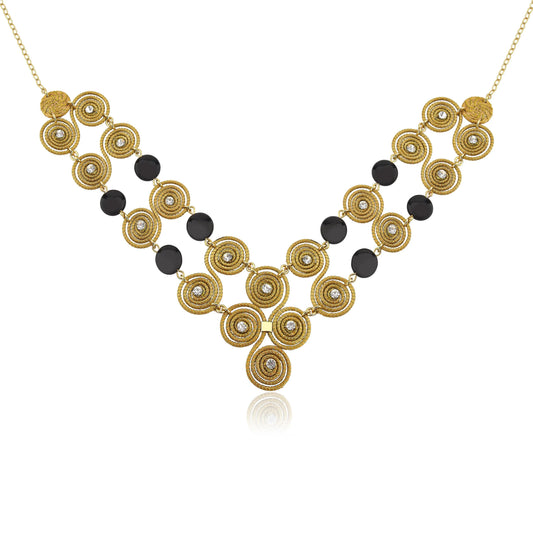 Golden Grass mandala necklace with zirconia and jasper stones, styled for a summer wedding guest outfit